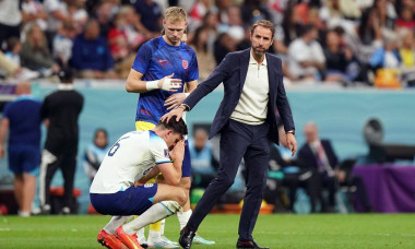 England's Harry Maguire is consoled by manager Gareth Southgate following defeat in the FIFA World Cup Quarter-Final match at the Al Bayt Stadium in Al Khor, Qatar. Picture date: Saturday December 10, 2022.