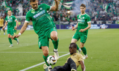 Budapest, Hungary. 15th May, 2024. Balint Vecsei of Paksi FC fights for the possession with Ibrahim Cisse of Ferencvarosi TC during the Hungarian Cup Final match between Paksi FC and Ferencvarosi TC at Puskas Arena on May 15, 2024 in Budapest, Hungary. Cr