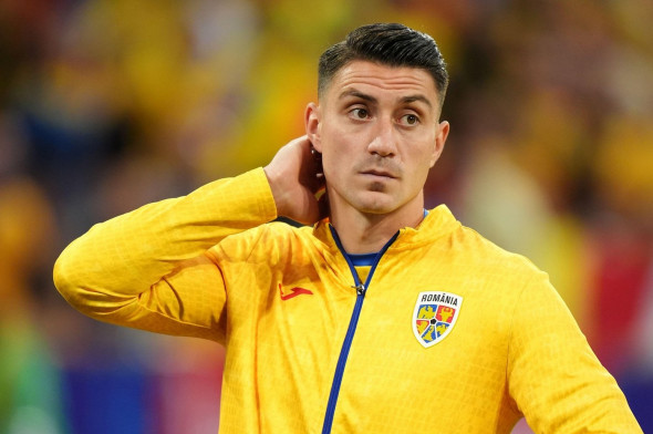 Romania's Ionut Nedelcearu dejected following the UEFA Euro 2024, round of 16 match at the Munich Football Arena in Munich, Germany. Picture date: Tuesday July 2, 2024.