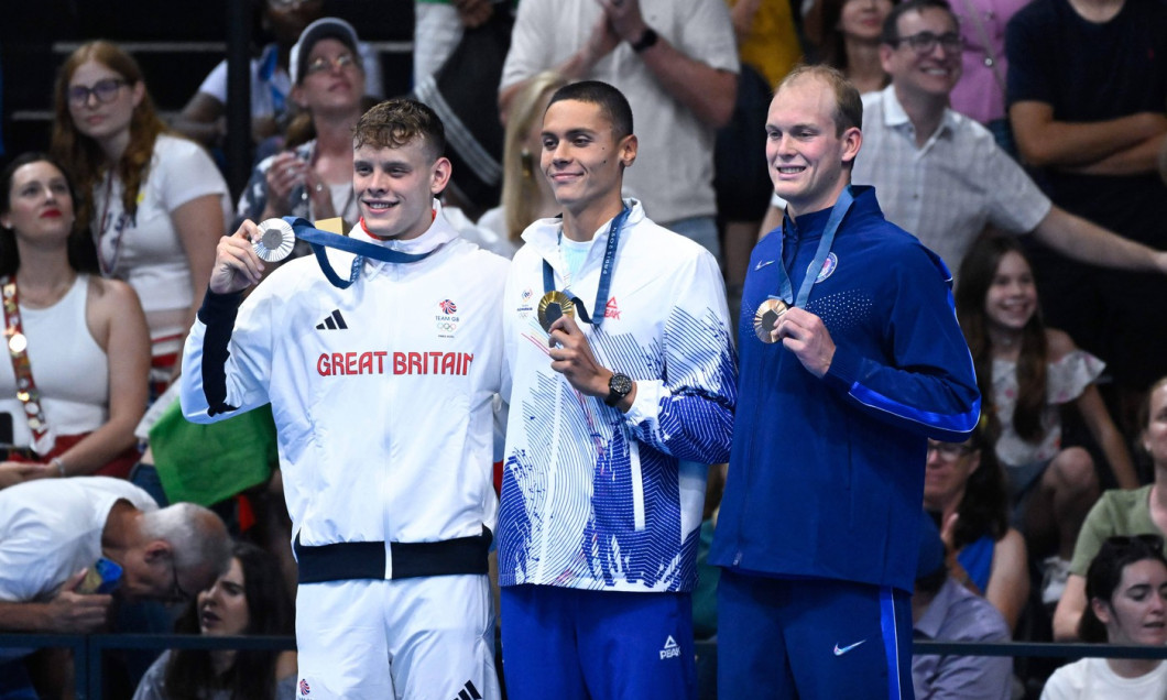 Popovici David ( ROU ) , Matthew Richards ( GBR ) and Luke Hobbson ( USA ) celebrate with medals during the 2024 Olympic