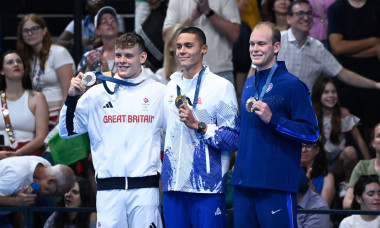 Popovici David ( ROU ) , Matthew Richards ( GBR ) and Luke Hobbson ( USA ) celebrate with medals during the 2024 Olympic