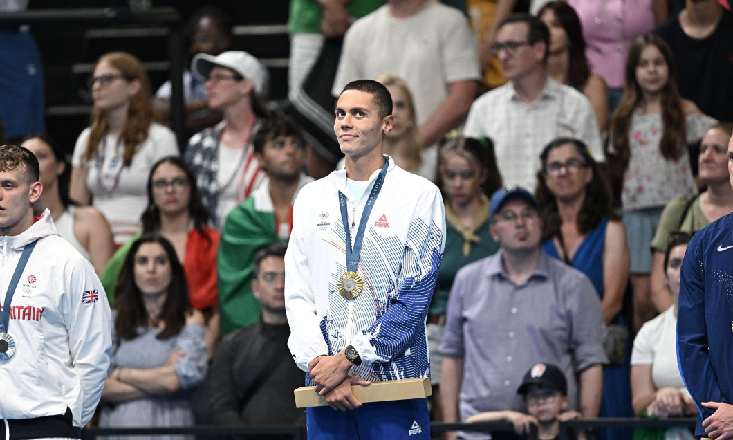 Nanterre, France. 29th July, 2024. Gold Medalist David Popovici of Team Roumanie stands on the podium during the Swimming medal ceremony after the men's 200m IFree Style Final at the Olympic Games Paris 2024 at Paris La Defense Arena on July 29, 2024 in N