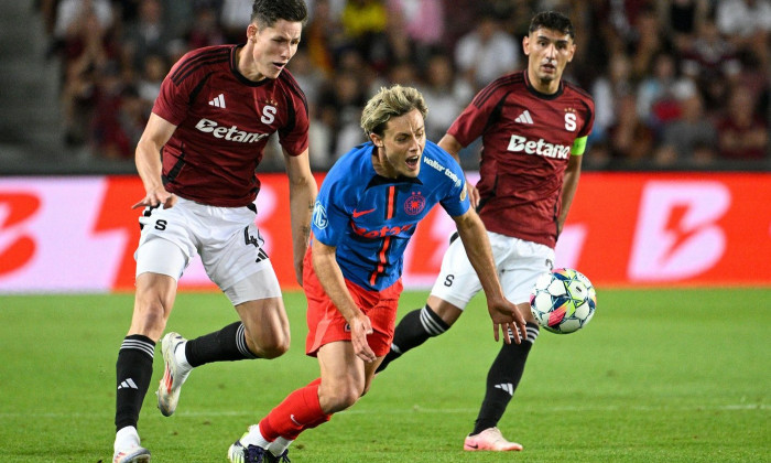 Prague, Czech Republic. 06th Aug, 2024. Martin Vitik of Sparta, left, and Wiliam Baeten of FCSB in action during the first leg of 3rd qualifying round match of football Champions League Sparta Praha vs FCSB (Romania) in Prague, Czech Republic, August 6, 2