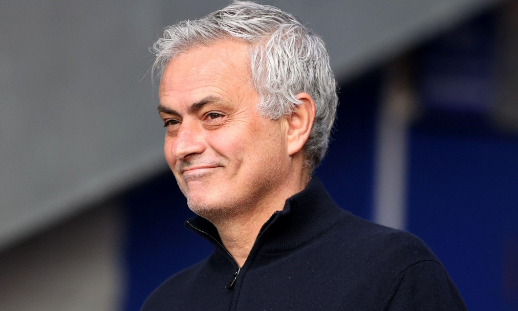 Tottenham Hotspur manager Jose Mourinho smiles as he chats with a Everton safety steward before the Premier League match at Goodison Park, Liverpool. Picture date: Friday April 16, 2021.