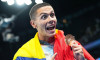 Paris, France. 31st July, 2024. Olympic Games, Paris 2024, 100 m freestyle, men, final, third-placed David Popovici from Romania celebrates with his bronze medal. Credit: Michael Kappeler/dpa/Alamy Live News