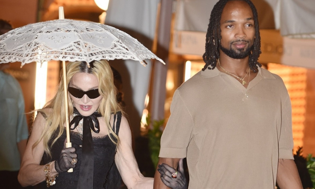 Pop legend Madonna shopping at Dolce &amp; Gabbana with her rumoured new beau 28-year-old Akeem Morris while on holiday in Portofino ahead her 66th birthday celebrations