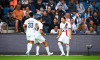 Lee Kang In ( 19 - PSG ) celebrates with teammates during the Ligue 1 match between Havre AC and Paris Saint Germain at