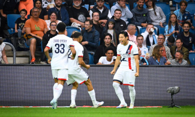 Lee Kang In ( 19 - PSG ) celebrates with teammates during the Ligue 1 match between Havre AC and Paris Saint Germain at