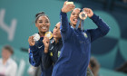 Paris, France. 05th Aug, 2024. (L to R) Silver Medallist Simone Biles of Team United States, Gold Medallist Rebeca Andrade and Bronze medallist Jordan Chiles of Team USA pose during the podium ceremony for the artistic gymnastics women's floor exercise ev