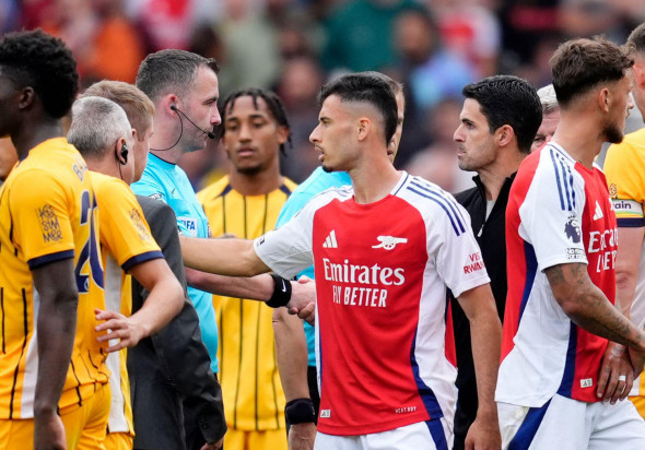 Arsenal manager Mikel Arteta shake hands with referee Christopher Kavanagh after the Premier League match at the Emirates Stadium, London. Picture date: Saturday August 31, 2024.