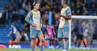 Jack Grealish of Manchester City speaks with Manuel Akanji of Manchester City during the UEFA Champions League league stage match Manchester City vs Inter Milan at Etihad Stadium, Manchester, United Kingdom, 18th September 2024(Photo by Cody Froggatt/Ne