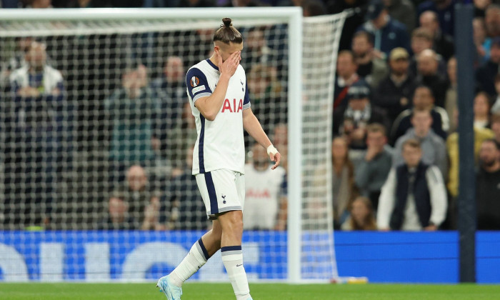 London, England, 26th September 2024. Tottenham s Radu Dragusin leaves the pitch after being sent off during the UEFA Eu