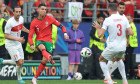 Dortmund, Germany, 22nd June 2024. Yusuf Yazici and Merih Demiral of Turkey close in as Cristiano Ronaldo of Portugal cr