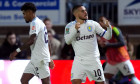 Aston Villa's Emi Buendia (right) celebrates scoring their side's first goal of the game during the Carabao Cup third round match at Adams Park, Wycombe. Picture date: Tuesday September 24, 2024.