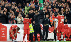 Liverpool, England, 25th September 2024. Liverpool s Federico Chiesa is substituted off for teammate Mohamed Salah durin