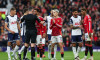 Referee Chris Kavanagh gives a red card to Bruno Fernandes of Manchester United during the Premier League match Manchester United vs Tottenham Hotspur at Old Trafford, Manchester, United Kingdom, 29th September 2024(Photo by Mark Cosgrove/News Images)