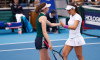 BEIJING, CHINA - SEPTEMBER 27: Cristina Bucsa of Spain and Monica Niculescu of Romania react in the Women s Doubles Roun