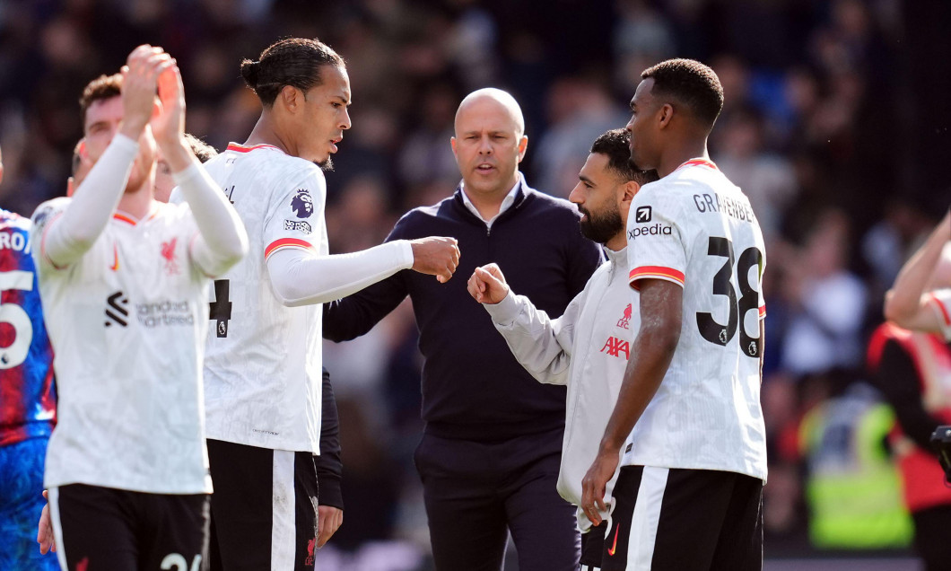 Liverpool's Virgil van Dijk and Mohamed Salah (centre right) after the final whistle of the Premier League match at Selhurst Park, London. Picture date: Saturday October 5, 2024.