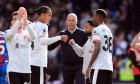 Liverpool's Virgil van Dijk and Mohamed Salah (centre right) after the final whistle of the Premier League match at Selhurst Park, London. Picture date: Saturday October 5, 2024.