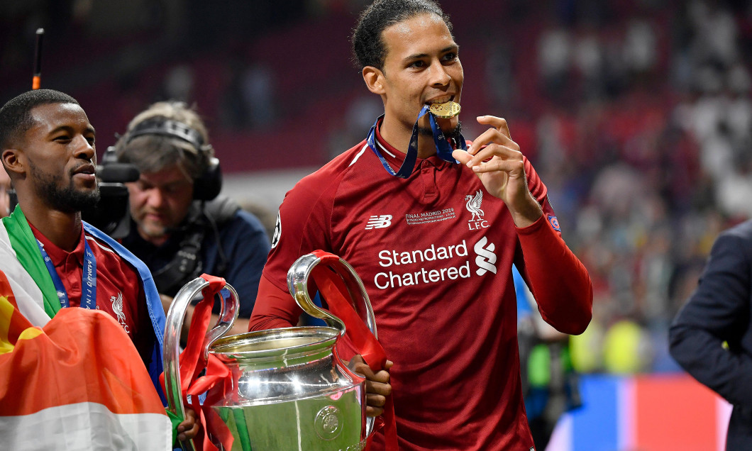 Madrid, Spain. 01st June, 2019. Liverpool's player Virgil Van Dijk of Liverpool FC celebrate with the trophy at the end of the during the 2019 UEFA Champions League Final match between Tottenham Hotspur and Liverpool at Wanda Metropolitano Stadium, Madrid