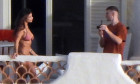 EXCLUSIVE: Elisabetta Canalis in a bikini and boy-friend Georgian Cimpeanu taking selfies on their room's balcony in Vulcano, Eolian Islands