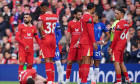 Liverpool's Diogo Jota (left) lays on the floor after being fouled during the Premier League match at Anfield, Liverpool. Picture date: Sunday October 20, 2024.