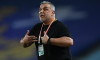 Head coach Cosmin Olaroiu of Jiangsu Suning reacts as he watches his players competing against Henan Jianye in their 22nd round match during the 2019 Chinese Football Association Super League (CSL) in Nanjing city, east China's Jiangsu province, 13 August