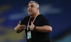 Head coach Cosmin Olaroiu of Jiangsu Suning reacts as he watches his players competing against Henan Jianye in their 22nd round match during the 2019 Chinese Football Association Super League (CSL) in Nanjing city, east China's Jiangsu province, 13 August