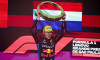 VERSTAPPEN Max (ned), Red Bull Racing RB20, portrait celebrating victory on the podium during the Formula 1 Grande Premi