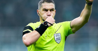 AC Milan v Arsenal - UEFA Champions League 2024/25 Referee Istvan Kovacs gestures during the UEFA Champions League 2024/