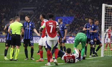 Milan, Italy, 6th November 2024. Yann Bisseck of FC Internazionale and Kai Havertz of Arsenal FC lay injured following a