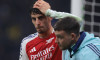 Milan, Italy, 6th November 2024. Kai Havertz of Arsenal FC holds a swab on his bloodied head as he leaves the field of p