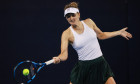 BEIJING, CHINA - SEPTEMBER 28: Irina Camelia Begu of Romania competes in the Women s Singles Round of 64 match against M