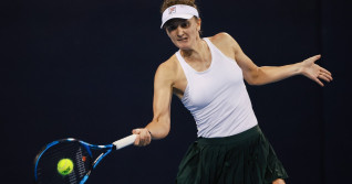 BEIJING, CHINA - SEPTEMBER 28: Irina Camelia Begu of Romania competes in the Women s Singles Round of 64 match against M