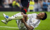 Real Madrid CF vs CA Osasuna - La Liga EA Sports 2024/25 Eder Militao of Real Madrid CF (C) seen injured on the ground d