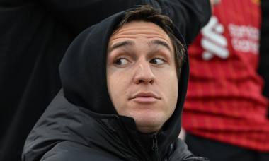 Federico Chiesa of Liverpool sits in the stands ahead of the Premier League match Liverpool vs Brighton and Hove Albion at Anfield, Liverpool, United Kingdom, 2nd November 2024(Photo by Cody Froggatt/News Images)