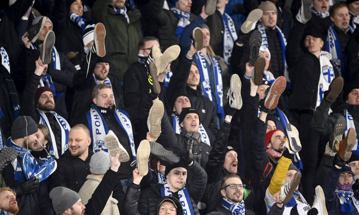 Finnish fans protesting against Finnish Football Federation by showing their shoes during UEFA Nations League football G