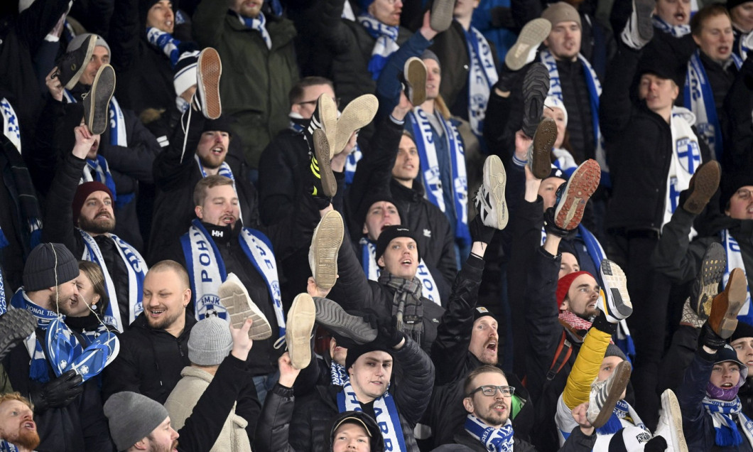 Finnish fans protesting against Finnish Football Federation by showing their shoes during UEFA Nations League football G