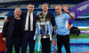 Manchester City manager Pep Guardiola alongside chairman Khaldoon Al Mubarak, Chief Executive Ferran Soriano and Director of Football, Txiki Begiristain with the Premier League trophy following the the Premier League match at The Etihad Stadium, Mancheste