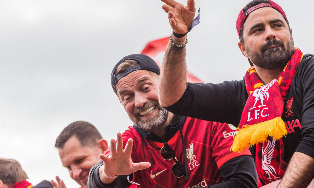 Jurgen Klopp celebrating during the 2022 winners parade through Liverpool in May 2022 having seen his team win the Carabao Cup and the FA Cup.