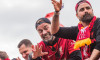 Jurgen Klopp celebrating during the 2022 winners parade through Liverpool in May 2022 having seen his team win the Carabao Cup and the FA Cup.