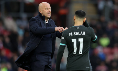 Southampton, England, 24th November 2024. Arne Slot, manager of Liverpool gives instructions to Mohamed Salah of Liverpo