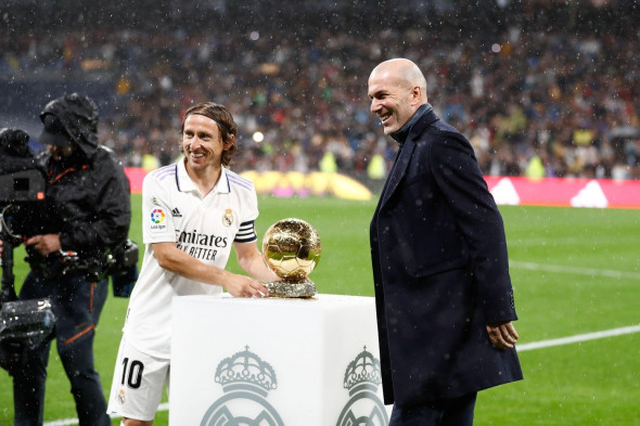 Luka Modric of Real Madrid and Zinedine Zidane gives the Golden Ball (Ballon DOr) to Karim Benzema during the Spanish championship La Liga football match between Real Madrid and Sevilla FC on October 22, 2022 at Santiago Bernabeu stadium in Ma