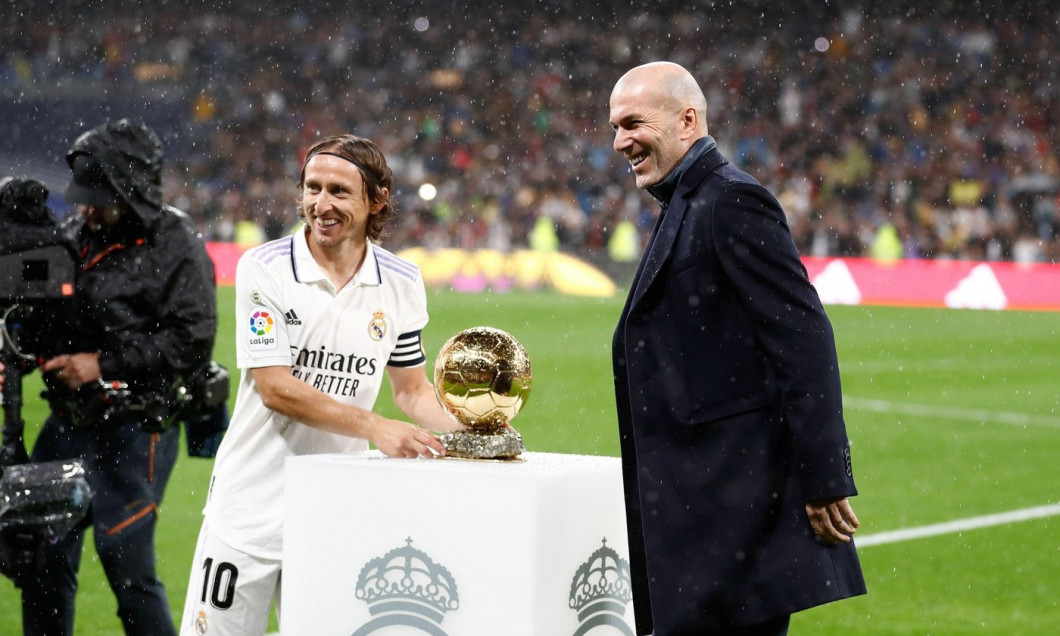 Luka Modric of Real Madrid and Zinedine Zidane gives the Golden Ball (Ballon D&#x80;&#x99;Or) to Karim Benzema during the Spanish championship La Liga football match between Real Madrid and Sevilla FC on October 22, 2022 at Santiago Bernabeu stadium in Ma