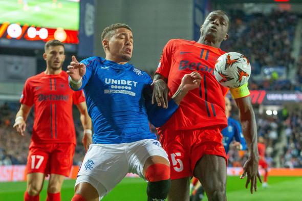 Rangers v Steaua Bucharest Europa League 24/10/2024. James Tavernier of Rangers FC battles with Joyskim Dawa of FC Steau