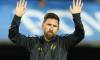 Argentinas forward Lionel Messi waves supporters during the warm up before the South American football qualifying match against Peru for the 2026 FIFA World Cup at La Bombonera stadium in Buenos Aires on November 19, 2024.