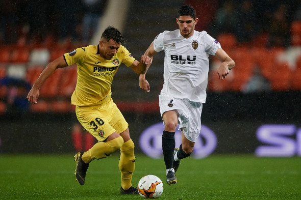 VALENCIA, SPAIN - APRIL 18: Goncalo Guedes (R) of Valencia CF in action Andrei Florin Ratiu of Villarreal CF during the UEFA Europa League Quarter Final Second Leg match between Valencia and Villarreal at Estadi de Mestalla on April 18, 2019 in Valencia,