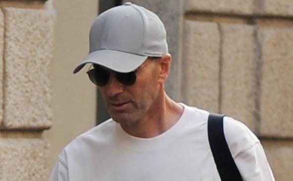 Zinedine Zidane caught walking downtown shopping with his wife Veronique.