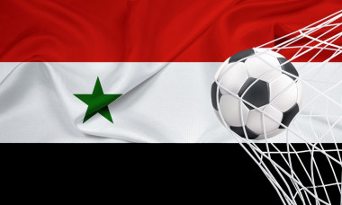 Football ball with the national flag of Syria. Flag of Syria. Horizontal Realistic waving flag of State of Syria. Fabric textured flowing flag of Syri