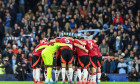 Manchester United team huddle ahead of kick off ofthe Premier League match Manchester City vs Manchester United at Etihad Stadium, Manchester, United Kingdom, 15th December 2024(Photo by Mark Cosgrove/News Images)